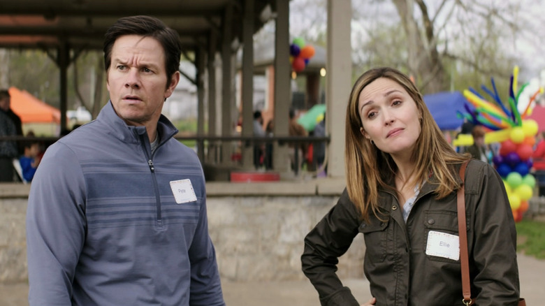 Mark Wahlberg as Peter Wagner stands beside Rose Byrne as Elinore Wagner in Instant Family