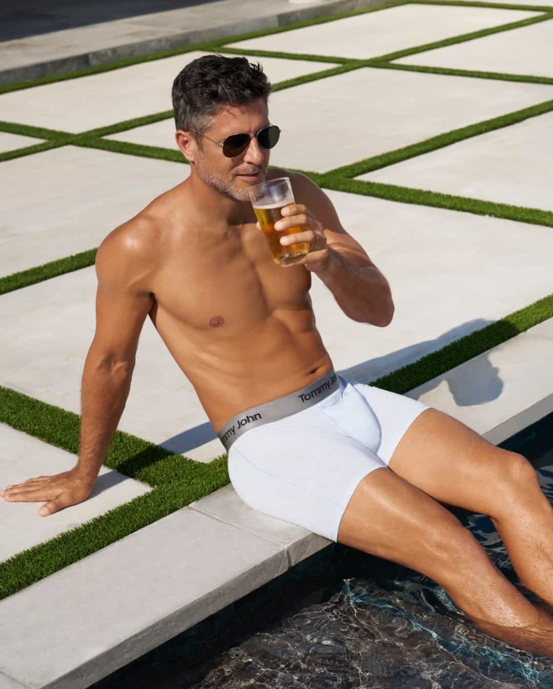 having a cold beer in the pool