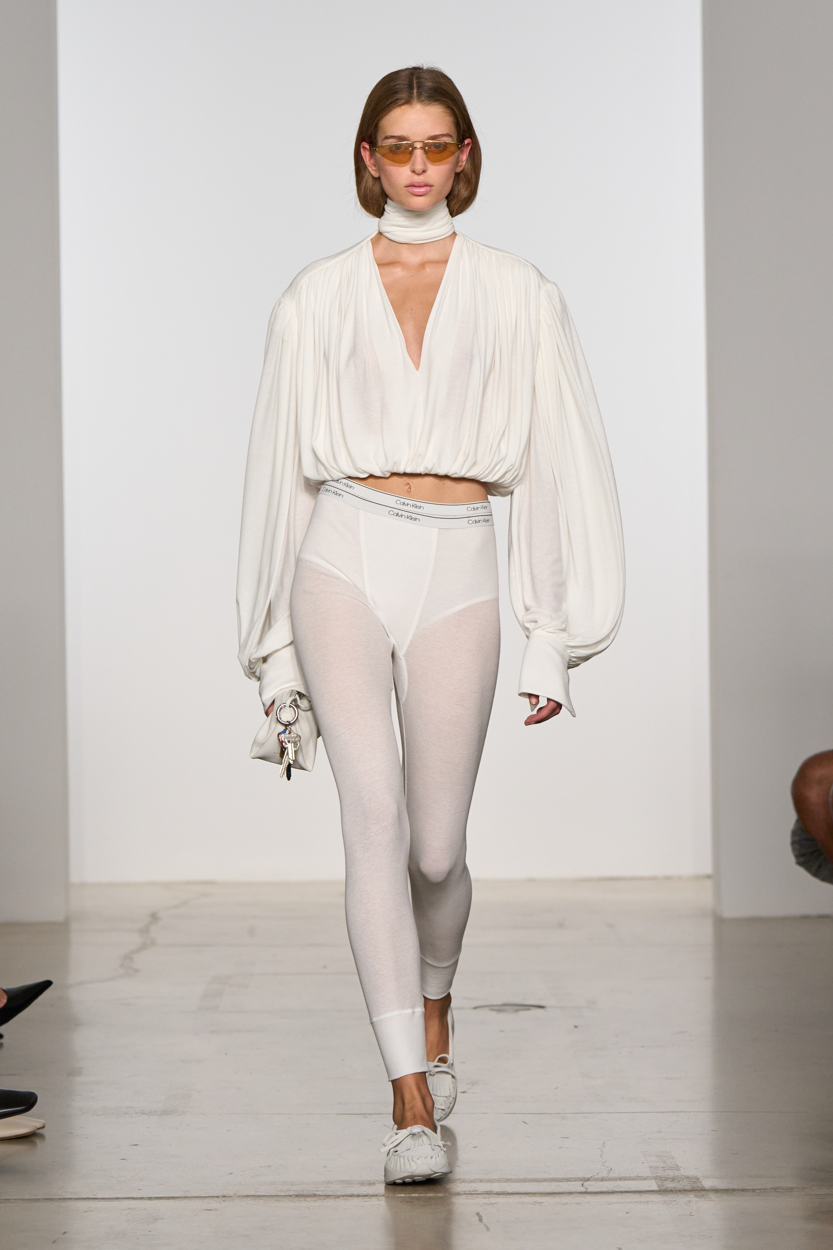 Models walking the calvin klein s/s 26 runway show.