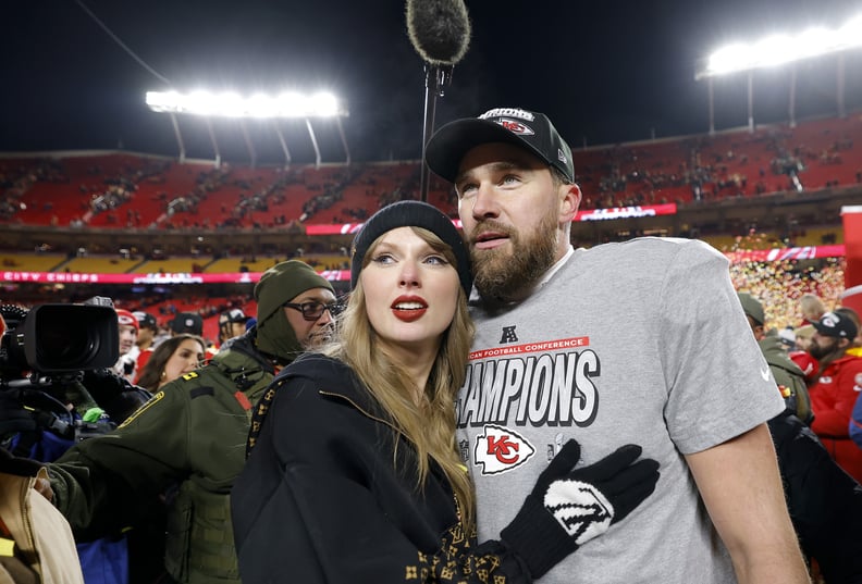 KANSAS CITY, MISSOURI - JANUARY 26: Taylor Swift celebrates with Travis Kelce #87 of the Kansas City Chiefs after defeating the Buffalo Bills 32-29 in the AFC Championship Game at GEHA Field at Arrowhead Stadium on January 26, 2025 in Kansas City, Missour