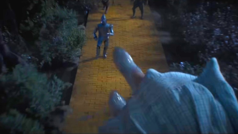 Dorothy being carried away by the flying monkeys in Wicked: For Good